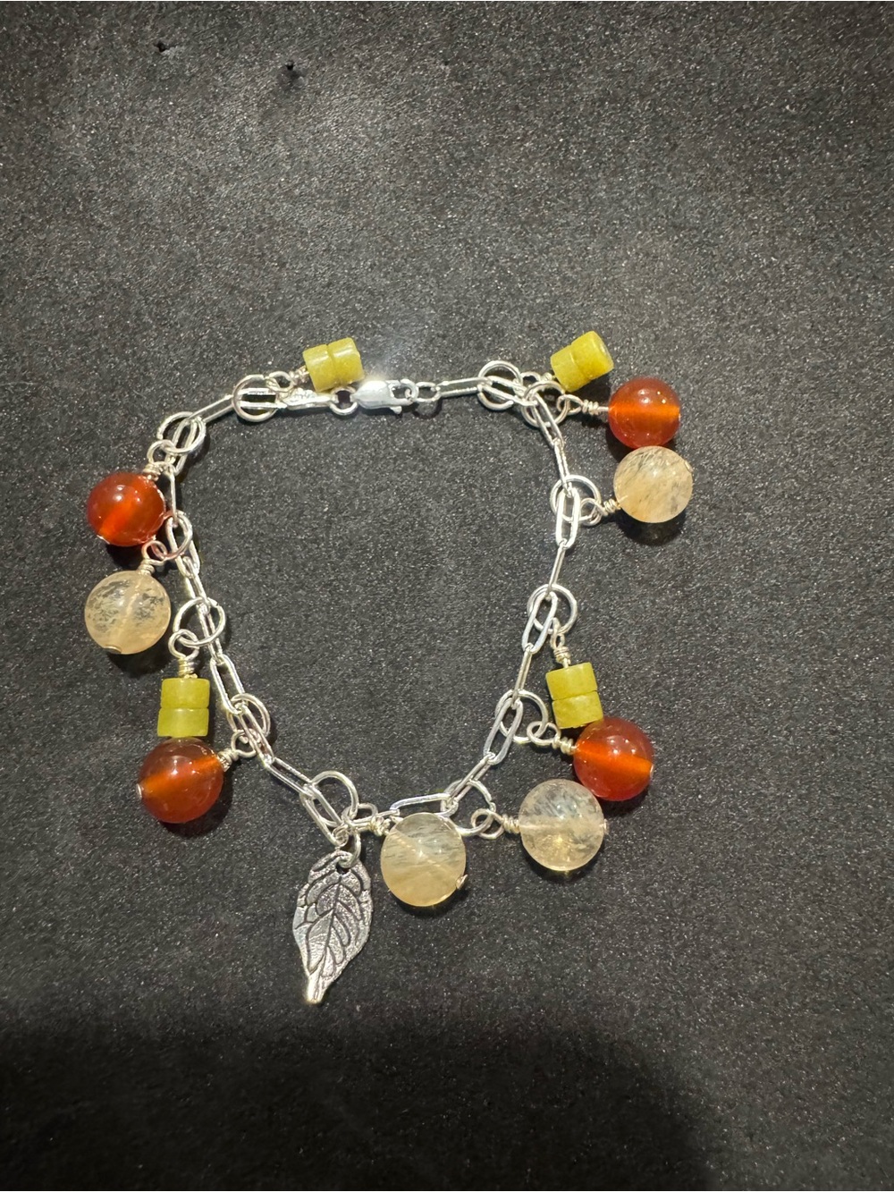 Handmade Silver Charm fall bracelet with carnelian and volcano quartz stones